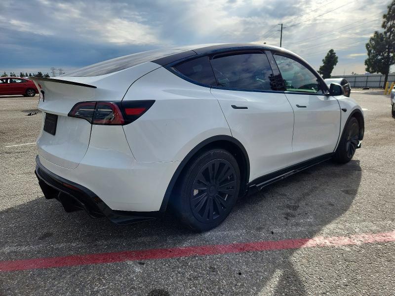 Photo 3 from auction – 2023 TESLA MODEL Y with VIN 7SAYGDEDXPF962628