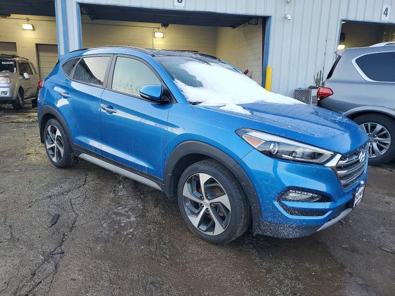 Photo 4 from auction – 2018 HYUNDAI TUCSON VALUE with VIN KM8J3CA22JU605897