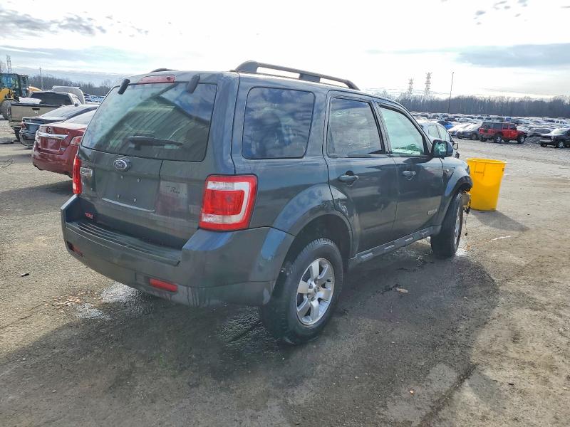 Photo 3 from auction – 2008 FORD ESCAPE LIM with VIN 1FMCU04118KA47697