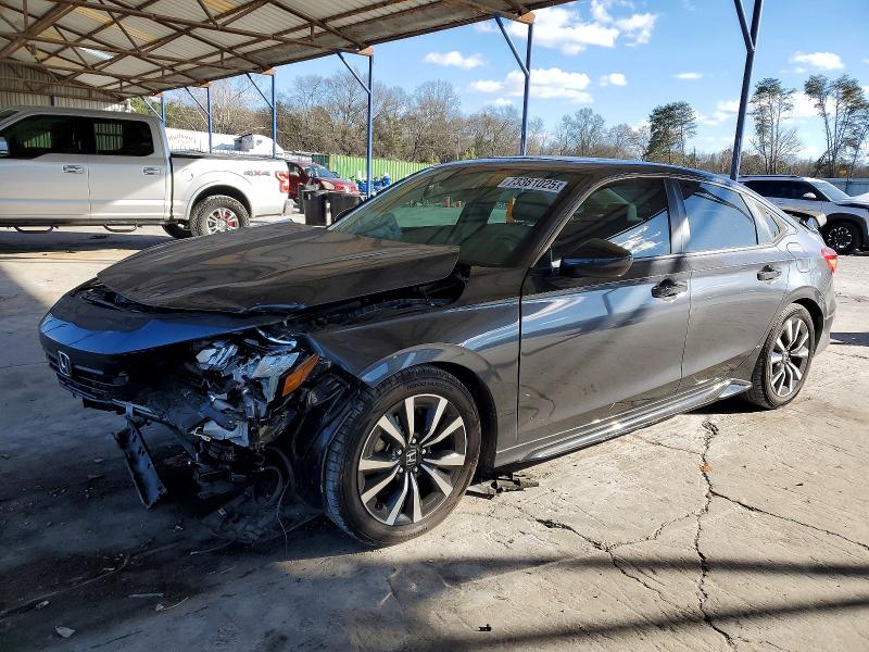 HONDA CIVIC EX 2022 with VIN 2HGFE1F71NH323273 - Photo from auction