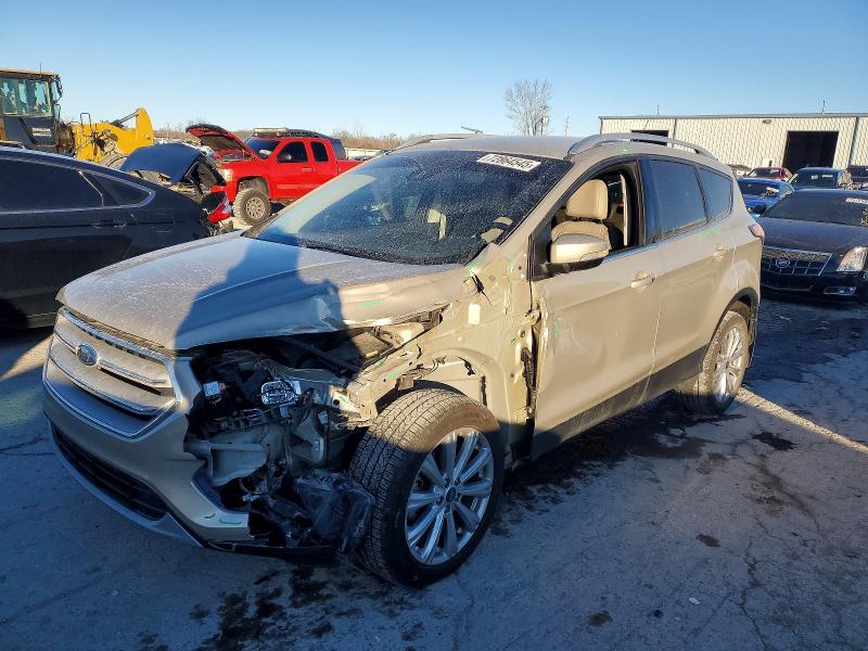 FORD ESCAPE TIT 2017 with VIN 1FMCU0JD9HUA36868 - Photo from auction