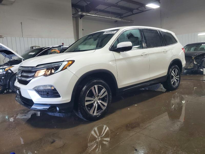 HONDA PILOT EXLN 2016 with VIN 5FNYF6H74GB084695 - Photo from auction