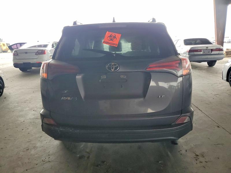 Photo 6 from auction – 2017 TOYOTA RAV4 with VIN JTMZFREV2HJ127885