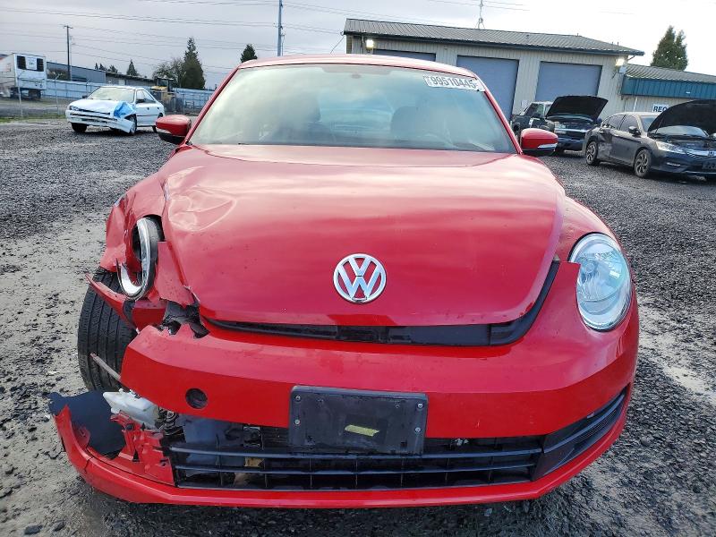 Photo 5 from auction – 2014 VOLKSWAGEN BEETLE with VIN 3VWHP7AT1EM602391