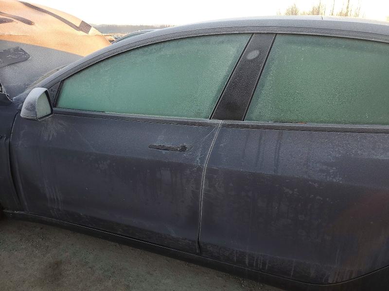 Photo 8 from auction – 2022 TESLA MODEL 3 with VIN 5YJ3E1EB8NF323235