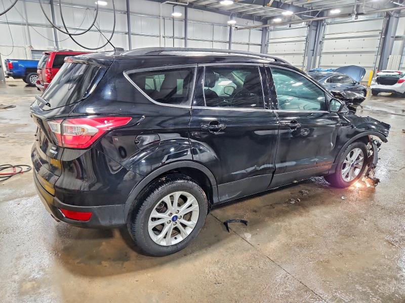 Photo 3 from auction – 2017 FORD ESCAPE SE with VIN 1FMCU9GD5HUD52182