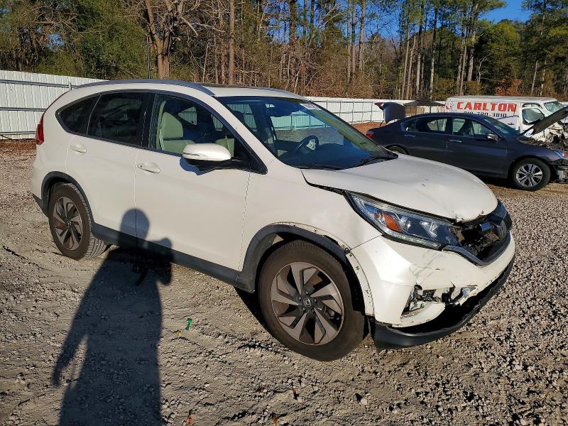 Photo 4 from auction – 2016 HONDA CR-V TOURI with VIN 5J6RM3H91GL025783