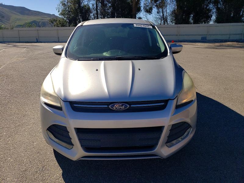 Photo 5 from auction – 2014 FORD ESCAPE SE with VIN 1FMCU0GX5EUD18521