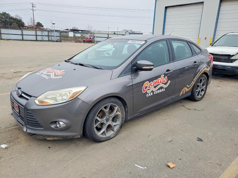 FORD FOCUS SE 2014 with VIN 1FADP3F2XEL220135 - Photo from auction