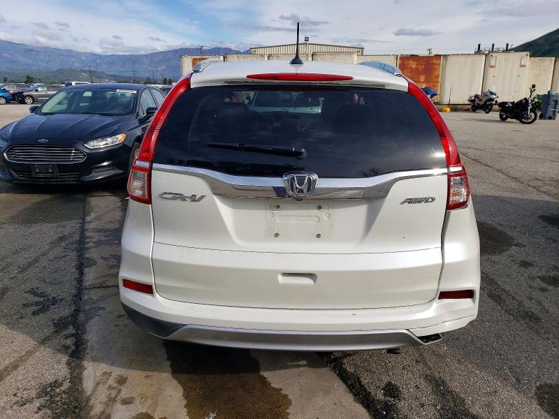 Photo 6 from auction – 2015 HONDA CR-V EXL with VIN 5J6RM4H79FL036579