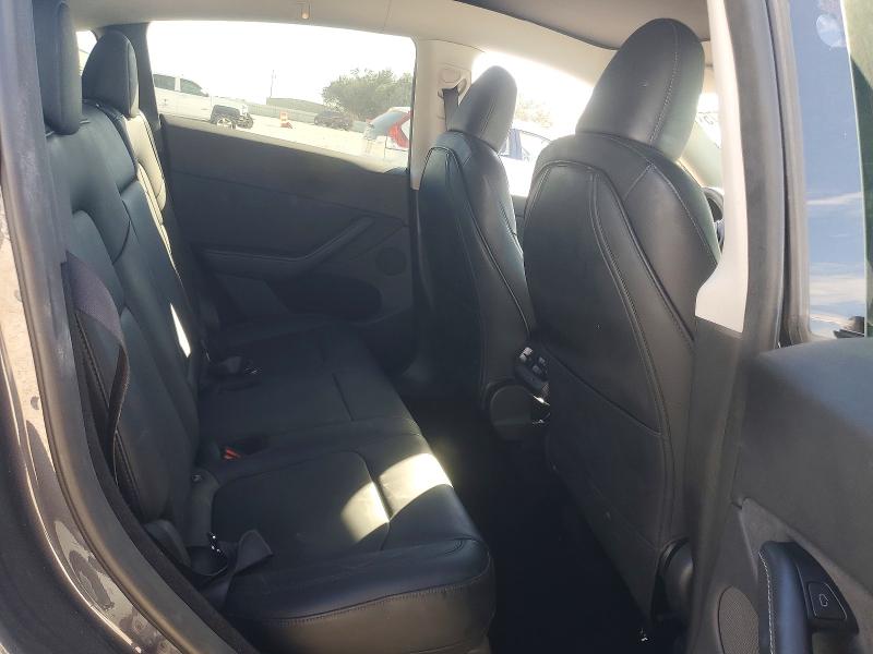 Photo 10 from auction – 2023 TESLA MODEL Y with VIN 7SAYGDEE8PA195982