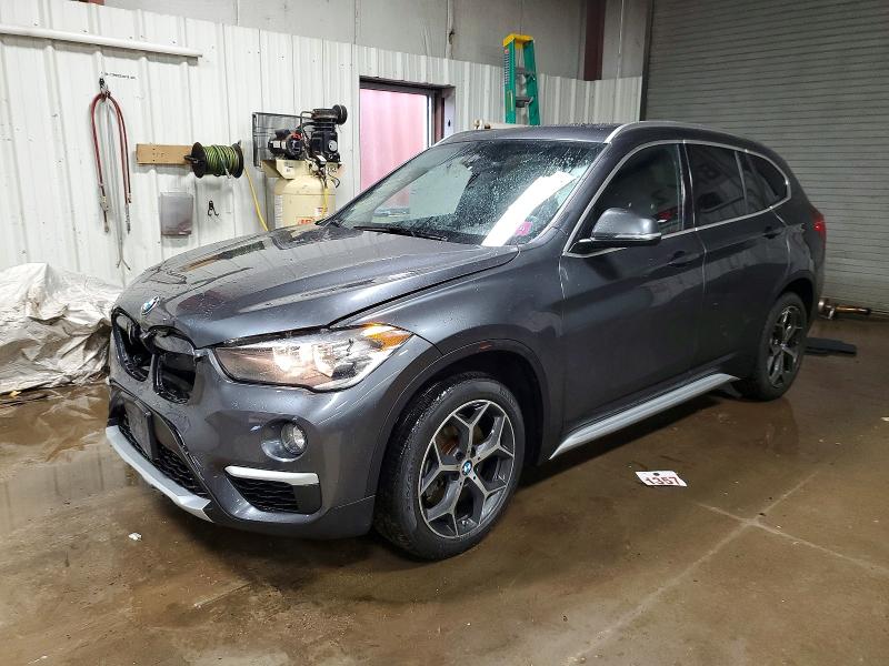 BMW X1 XDRIVE2 2018 with VIN WBXHT3C33J3H30668 - Photo from auction