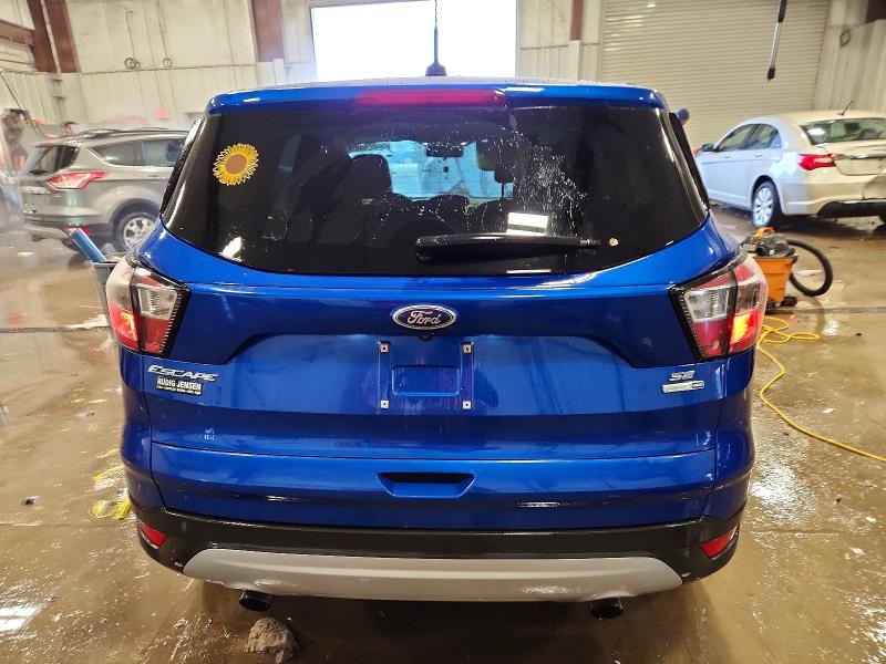 Photo 6 from auction – 2017 FORD ESCAPE with VIN 1FMCU9GD1HUB60726