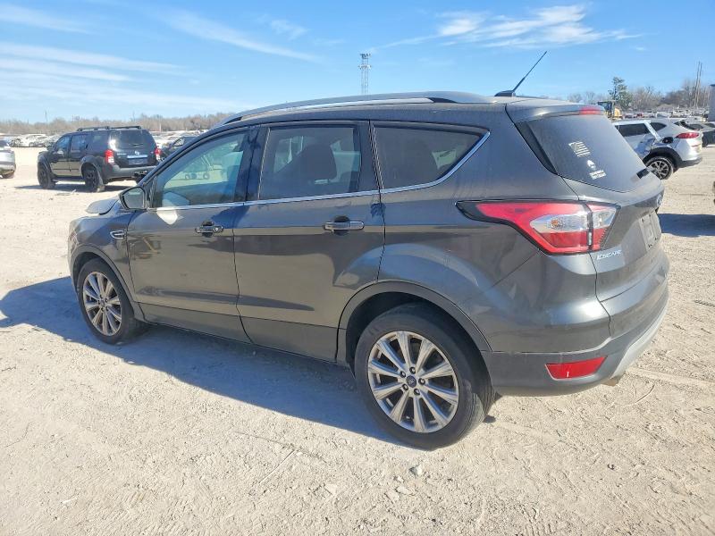 Photo 2 from auction – 2017 FORD ESCAPE TIT with VIN 1FMCU9JDXHUC93476