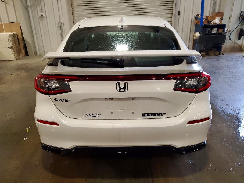 Photo 6 from auction – 2022 HONDA CIVIC SPOR with VIN 19XFL2H87NE019585