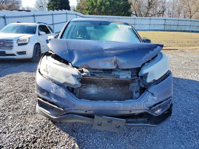 Photo 5 from auction – 2015 HONDA CR-V with VIN 5J6RM4H31FL066365