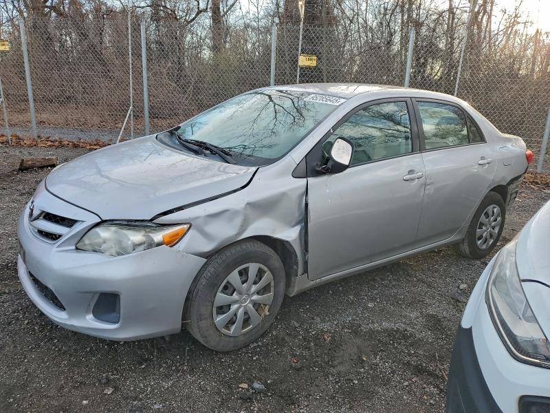 TOYOTA COROLLA 2011 with VIN 2T1BU4EEXBC717118 - Photo from auction