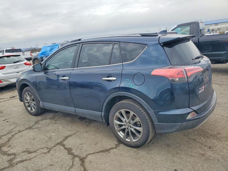 Photo 2 from auction – 2017 TOYOTA RAV4 LIMIT with VIN JTMYFREV1HJ720830