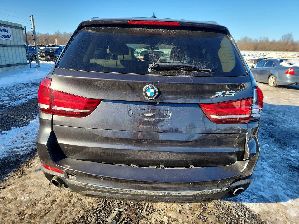 Фото 6 с аукциона – 2014 BMW X5 с VIN 5UXKR0C57E0H27148