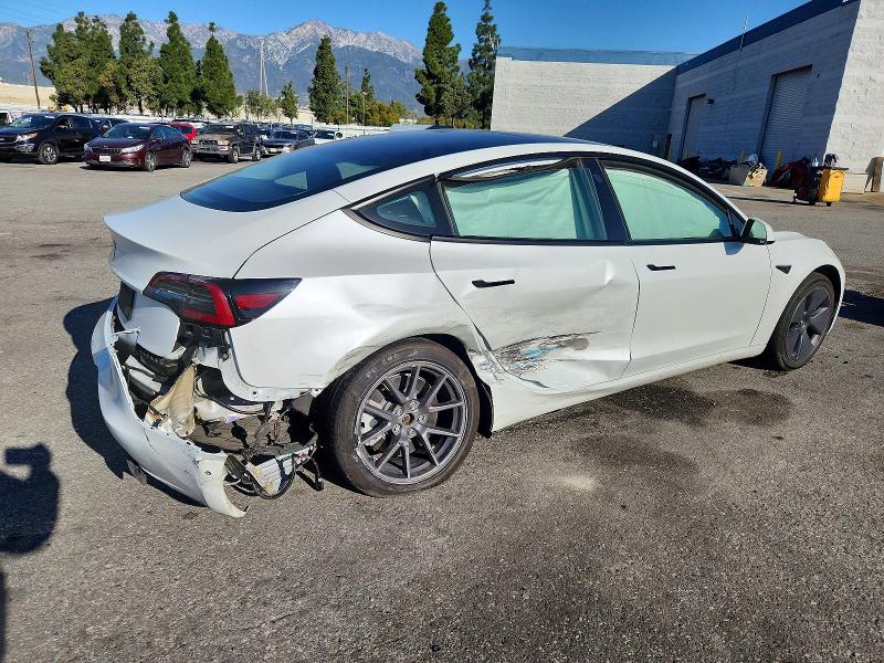 Photo 3 from auction – 2022 TESLA MODEL 3 with VIN 5YJ3E1EA8NF299235