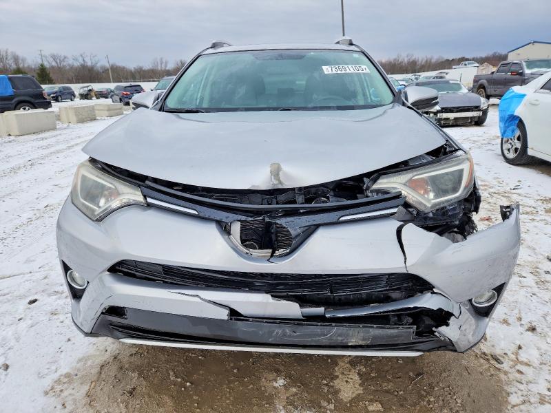 Photo 5 from auction – 2016 TOYOTA RAV4 XLE with VIN 2T3RFREV6GW521941