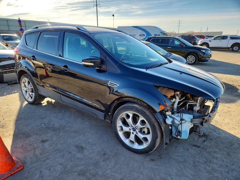 Photo 4 from auction – 2014 FORD ESCAPE TIT with VIN 1FMCU0J99EUA62068