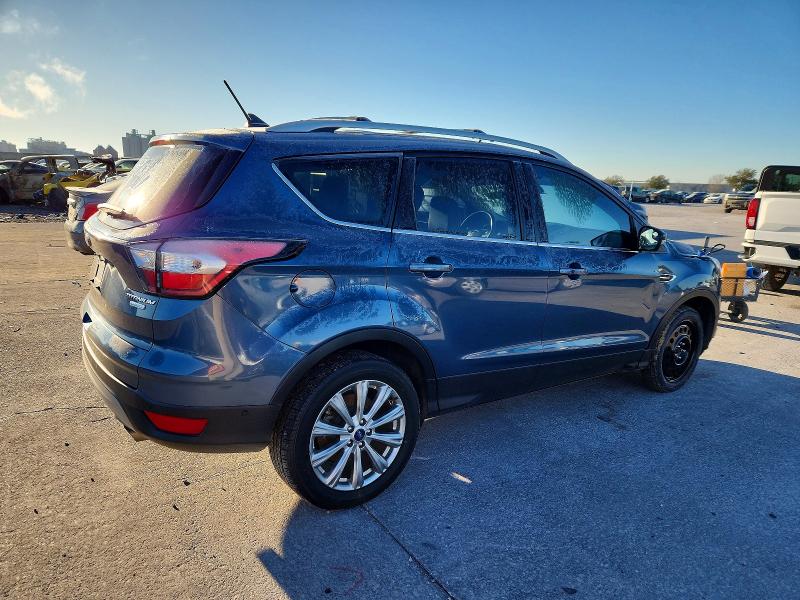 Photo 3 from auction – 2018 FORD ESCAPE TIT with VIN 1FMCU0J91JUA16762