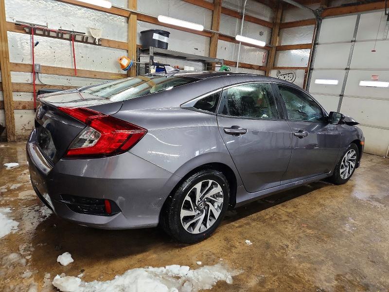 Photo 3 from auction – 2018 HONDA CIVIC EX with VIN 2HGFC2F79JH593048