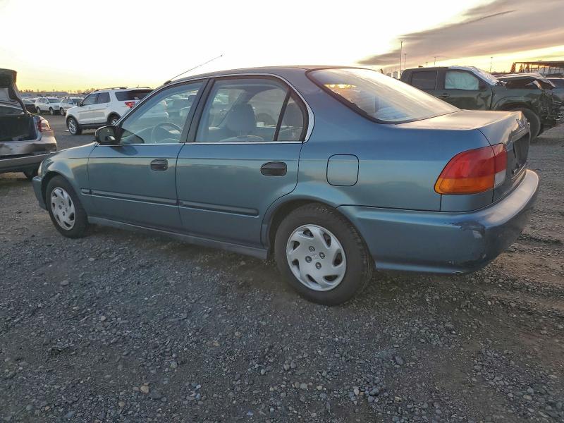 Photo 2 from auction – 1997 HONDA CIVIC LX with VIN JHMEJ6570VS020643
