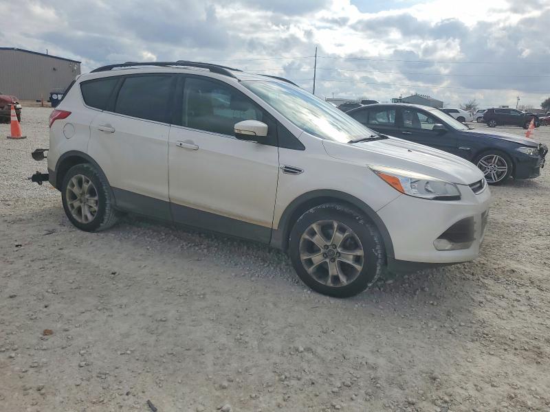 Photo 4 from auction – 2013 FORD ESCAPE with VIN 1FMCU0H90DUB40130