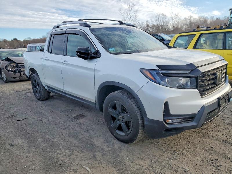 Photo 4 from auction – 2021 HONDA RIDGELINE with VIN 5FPYK3F85MB020240