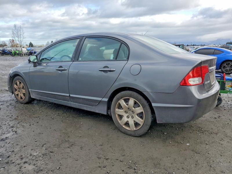 Photo 2 from auction – 2010 HONDA CIVIC with VIN 19XFA1F51AE034800