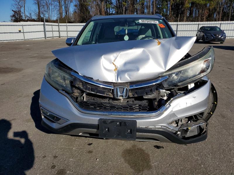 Photo 5 from auction – 2015 HONDA CR-V EXL with VIN 2HKRM3H71FH538880