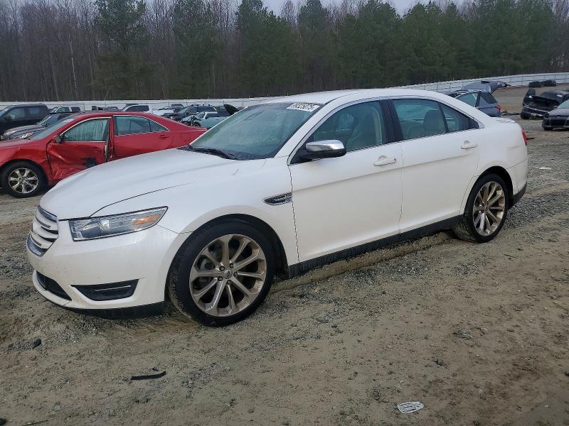 FORD TAURUS 2014 with VIN 1FAHP2F82EG152082 - Photo from auction