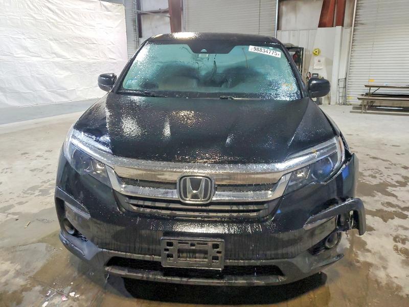 Photo 5 from auction – 2020 HONDA PILOT LX with VIN 5FNYF6H17LB035349