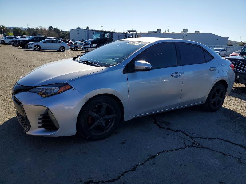 TOYOTA COROLLA L 2018 with VIN 2T1BURHE3JC023815 - Photo from auction