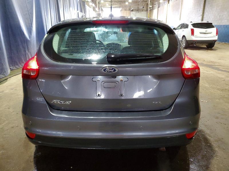 Foto 6 de la subasta – 2018 FORD FOCUS con VIN 1FADP3M21JL310948