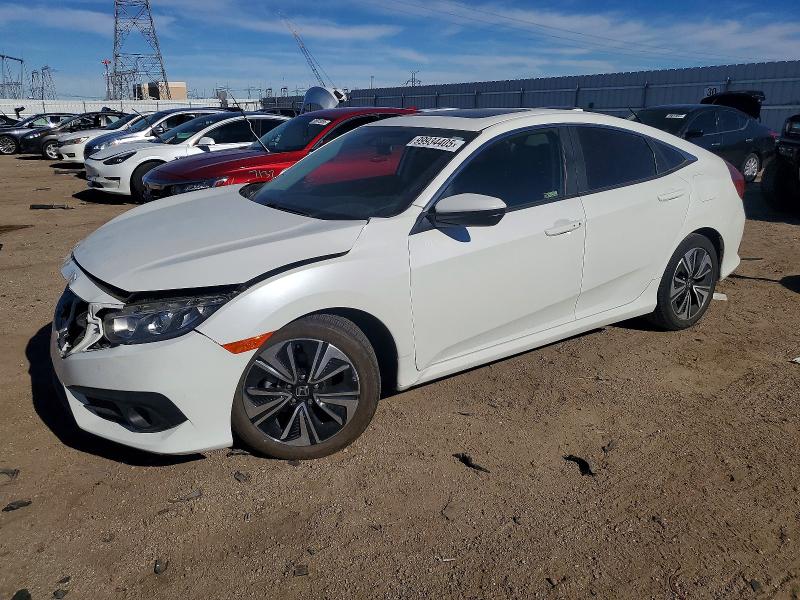 HONDA CIVIC EX 2018 with VIN JHMFC1F38JX037281 - Photo from auction