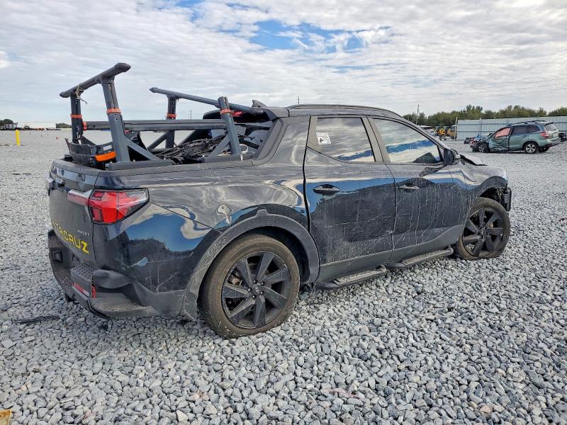Photo 3 from auction – 2023 HYUNDAI SANTA CRUZ with VIN 5NTJCDAF8PH063769