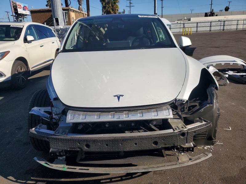 Photo 5 from auction – 2022 TESLA MODEL Y with VIN 7SAYGDEFXNF409931