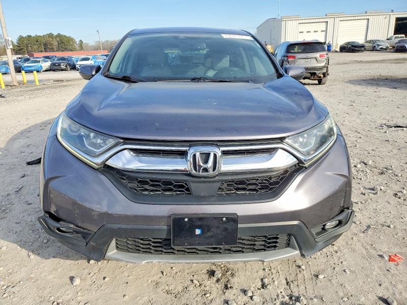 Photo 5 from auction – 2017 HONDA CR-V with VIN 7FARW1H88HE035490