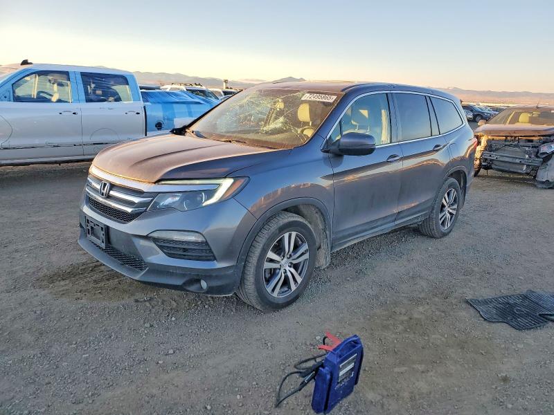 HONDA PILOT EXLN 2018 with VIN 5FNYF6H76JB050281 - Photo from auction