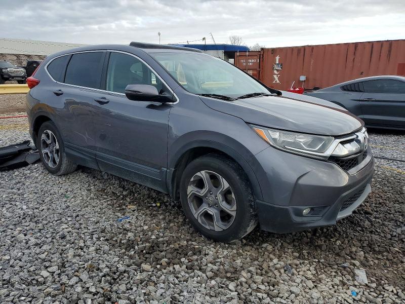 Photo 4 from auction – 2018 HONDA CR-V with VIN 7FARW1H87JE040041