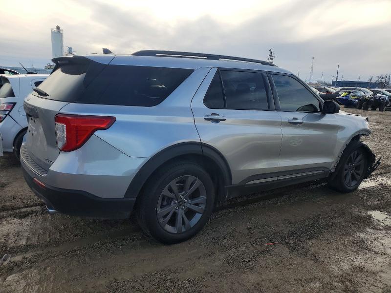 Photo 3 from auction – 2021 FORD EXPLORER X with VIN 1FMSK8DHXMGA79350