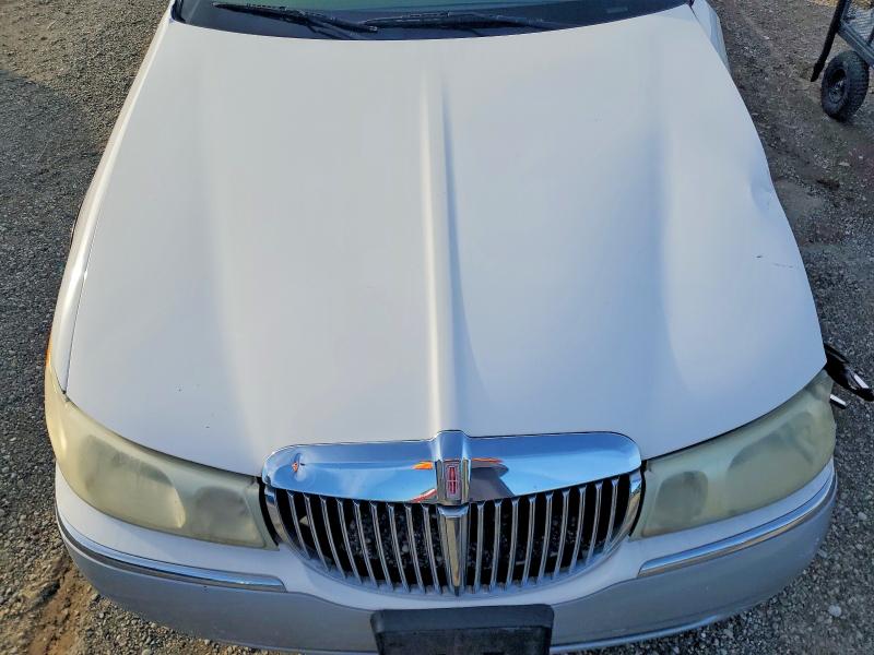 Photo 11 from auction – 2001 LINCOLN TOWN CAR E with VIN 1LNHM81W11Y659356