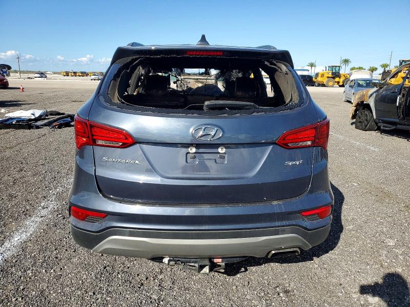 Photo 6 from auction – 2017 HYUNDAI SANTA FE S with VIN 5NMZU3LB4HH006695