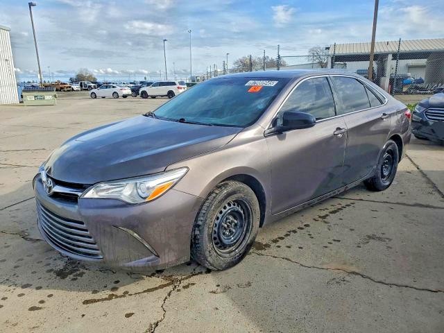 TOYOTA CAMRY LE 2017 with VIN 4T1BF1FK1HU765286 - Photo from auction
