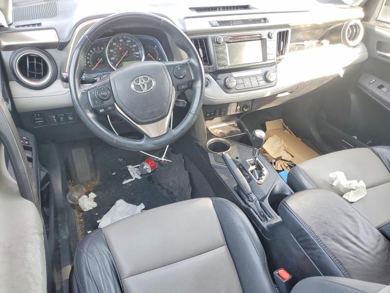 Photo 8 from auction – 2014 TOYOTA RAV4 with VIN 2T3YFREV1EW100220