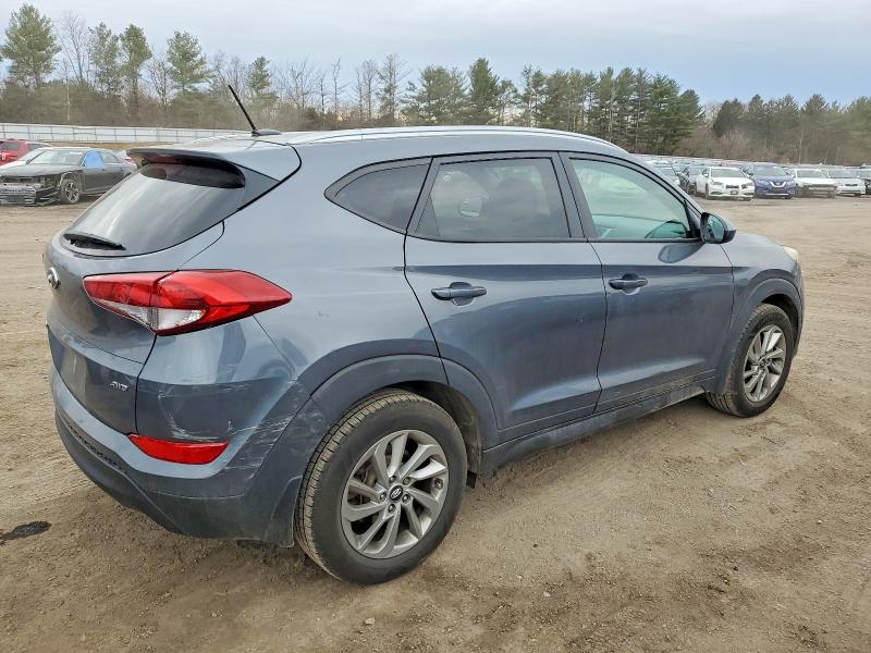 Photo 3 from auction – 2016 HYUNDAI TUCSON LIM with VIN KM8J3CA42GU104342