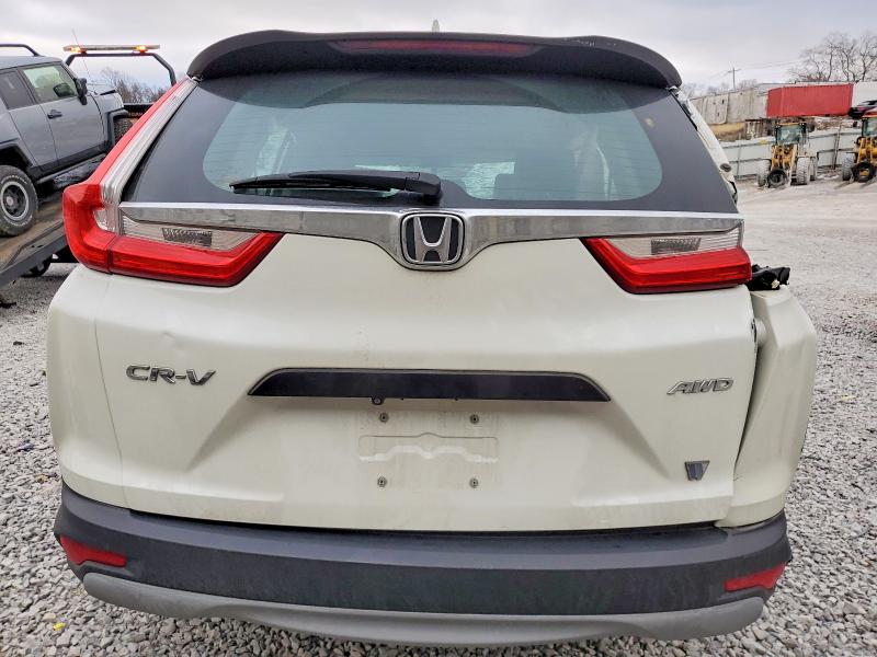 Photo 6 from auction – 2017 HONDA CR-V LX with VIN 2HKRW6H33HH224773